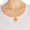 Stella Mccartney Crest Embossed GoldTone Pendant Necklace in Gold - Lyst