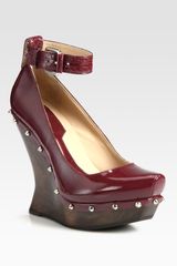 McQ by Alexander McQueen Patent Leather Studded Ankle Strap Wedges