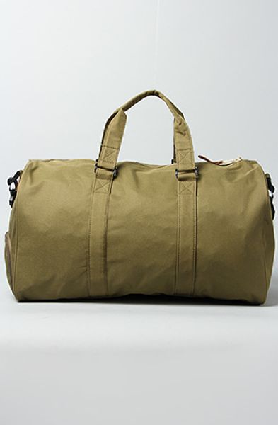 Herschel Supply Co. The Novel Duffle Bag in Army in Green for Men (army) | Lyst