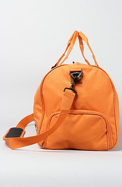 Herschel Supply Co. The Novel Duffle Bag in Orange in Orange for Men | Lyst
