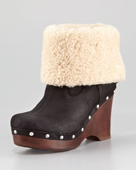 black uggs with brown trim
