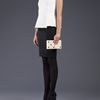Charlotte Olympia Domino Clutch in White - Lyst