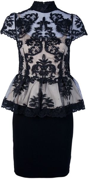 Alice + Olivia Peplum Lace Top in Black - Lyst