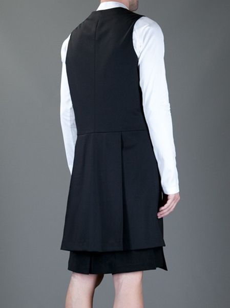 long black sleeveless vest