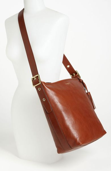 cognac leather duffle bag