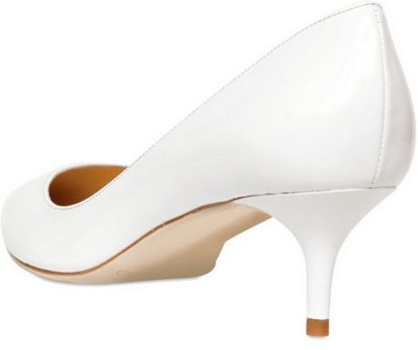 white patent leather platform pumps