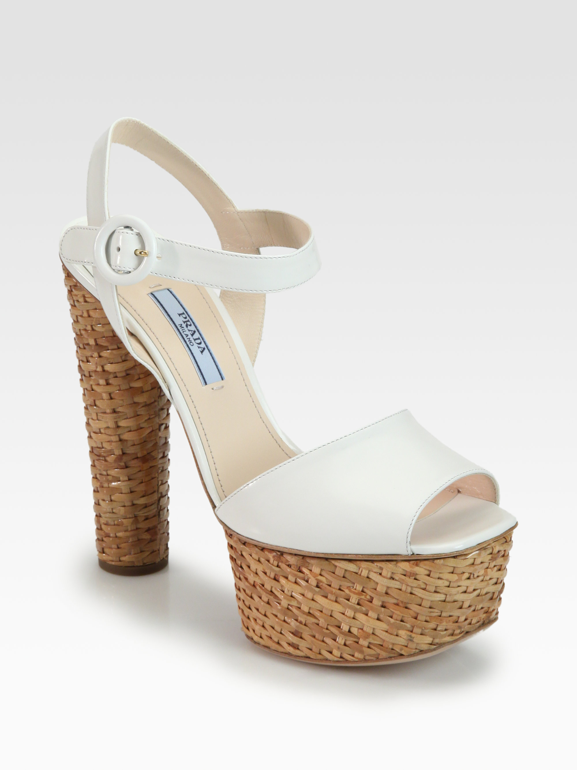 Prada Spazzolato Leather Wicker Platform Sandals in (white)