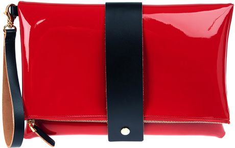 red clutch bag with strap