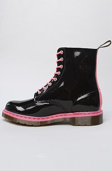 Dr. Martens The Pascal 8eye Boot in Black and Acid Pink Patent in Black