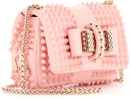 http://cdnb.lystit.com/photos/2013/02/05/christian-louboutin-pink-sweet-charity-studded-leather-clutch-product-5-6325530-035859059_large_flex.jpeg
