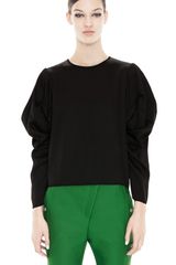 Acne Ava Fluid Jet Black