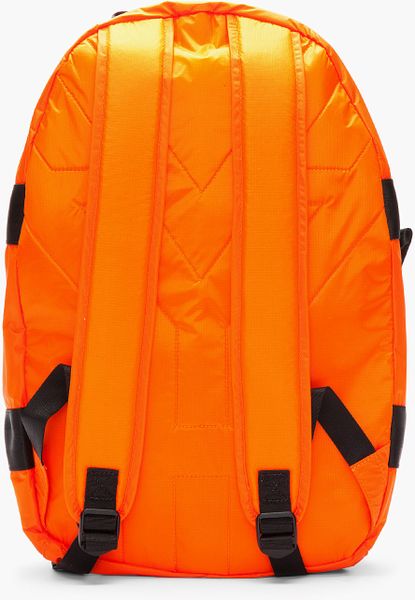 bright orange nike backpack