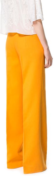 orange trousers zara