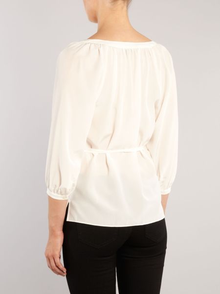 white silk wrap blouse