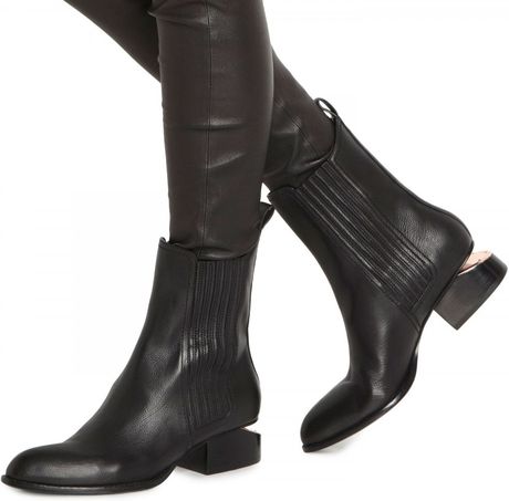 black boots with rose gold
