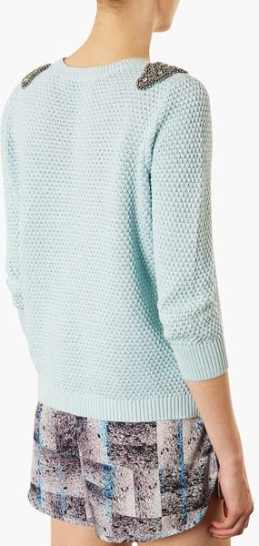 green embellished sweater
