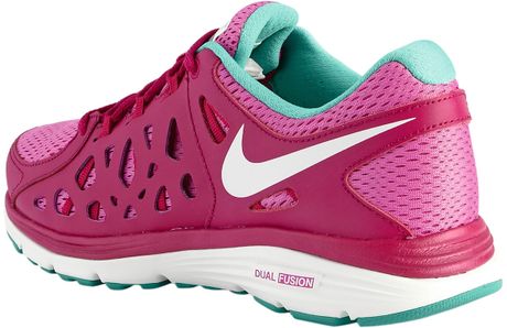 nike revolution pink trainers
