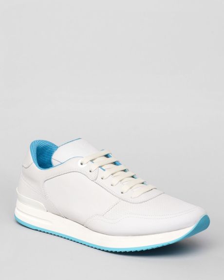 white solid sneakers for men