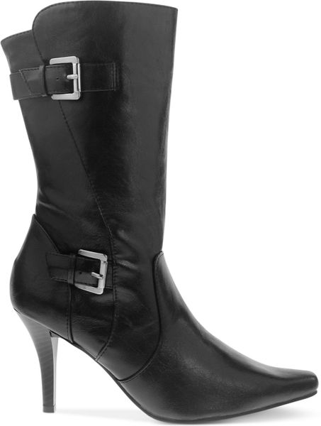 black dress with tall boots