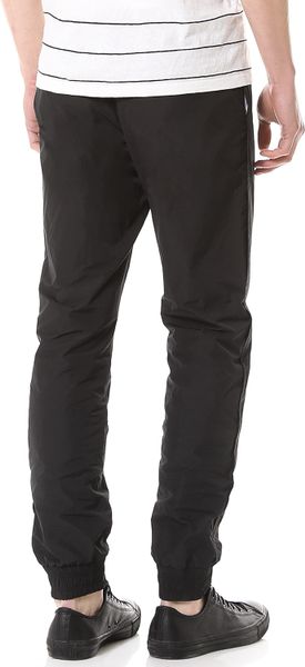 black nylon track pants