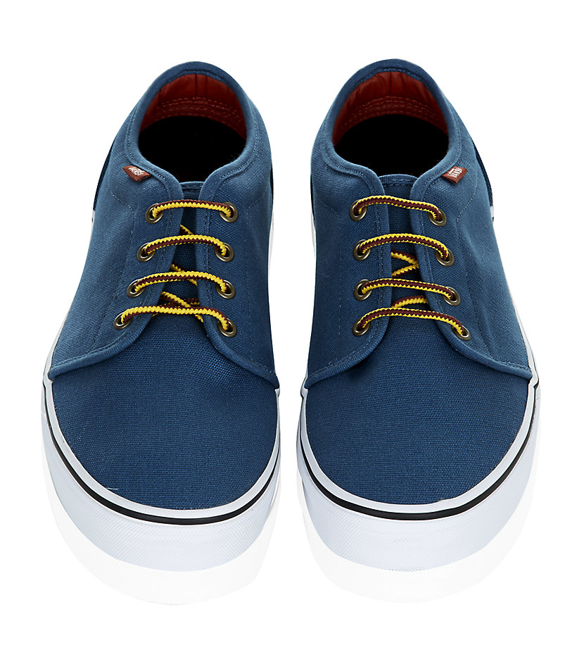 teal and blue vans