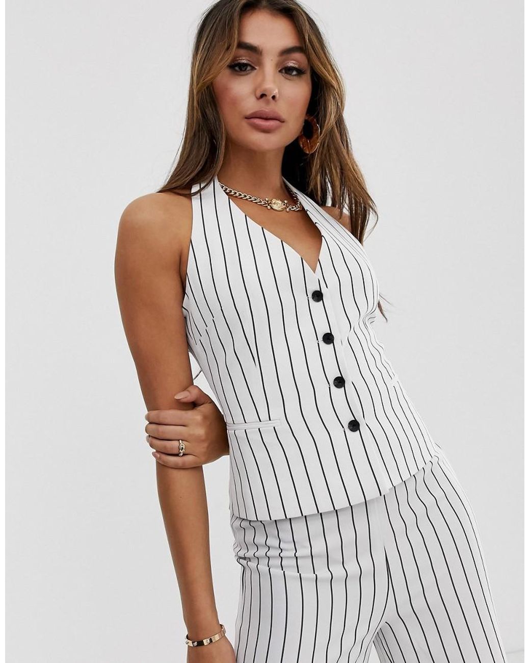 white pinstriped suit