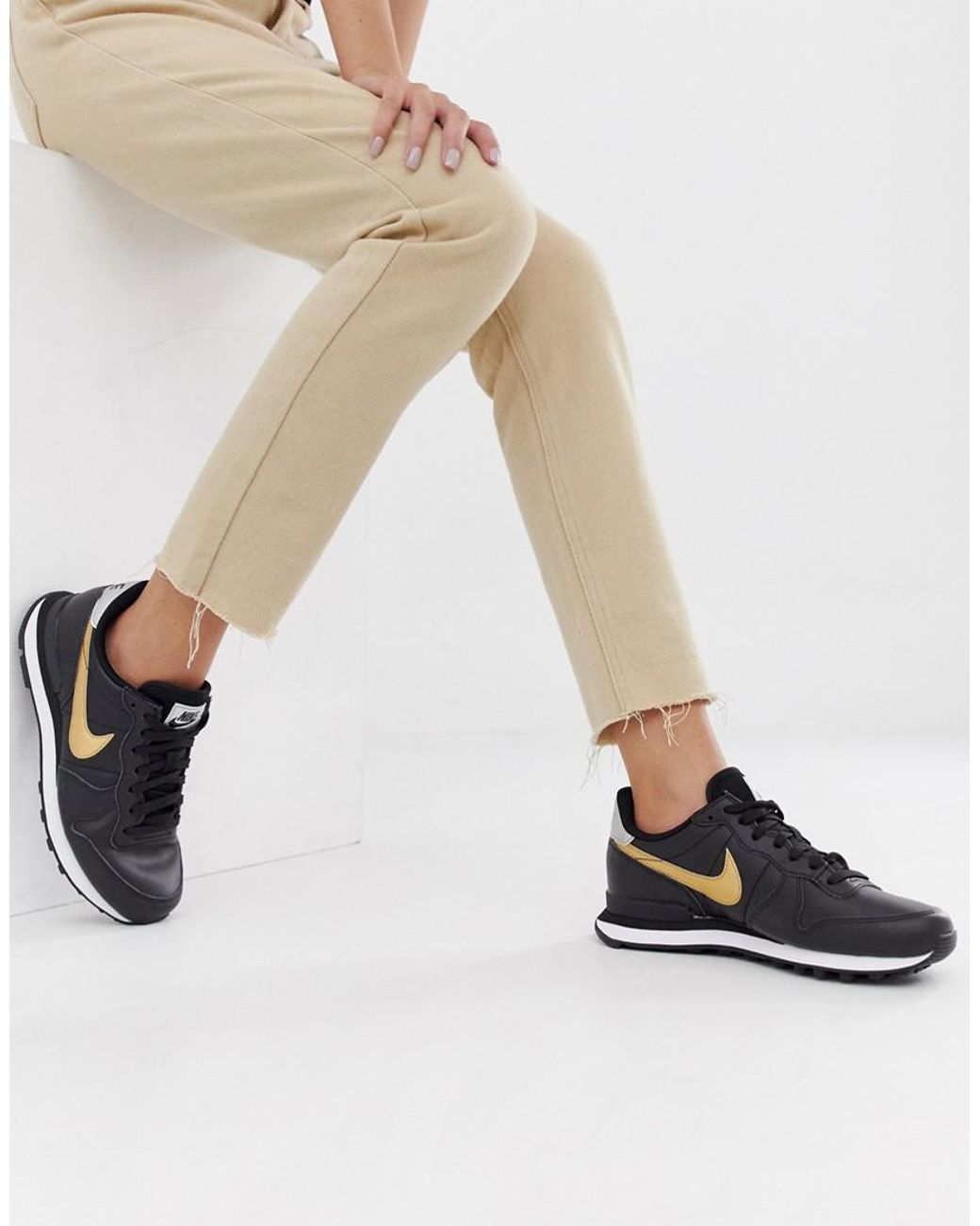 nike black and gold womens