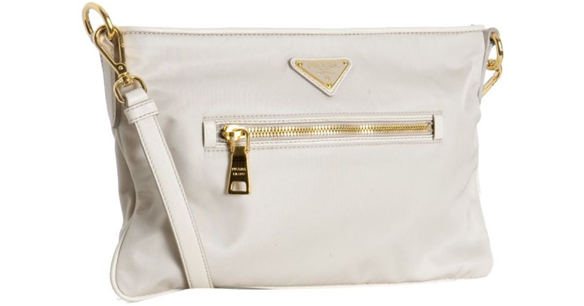 embossed ivory prada mini handbag  