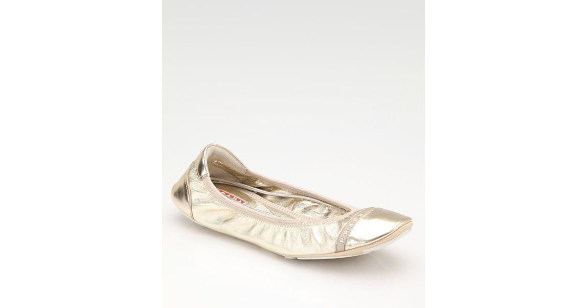 prada gold ballet flats