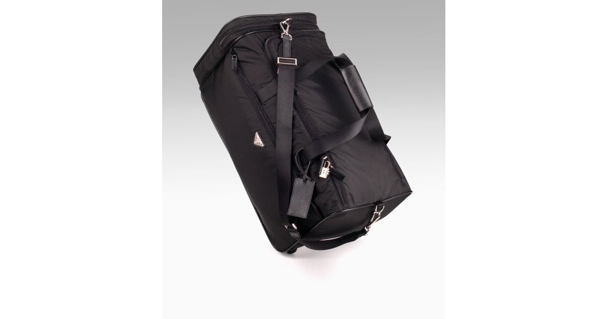 Prada Nylon/leather Roll Duffle Bag in Black for Men | Lyst  