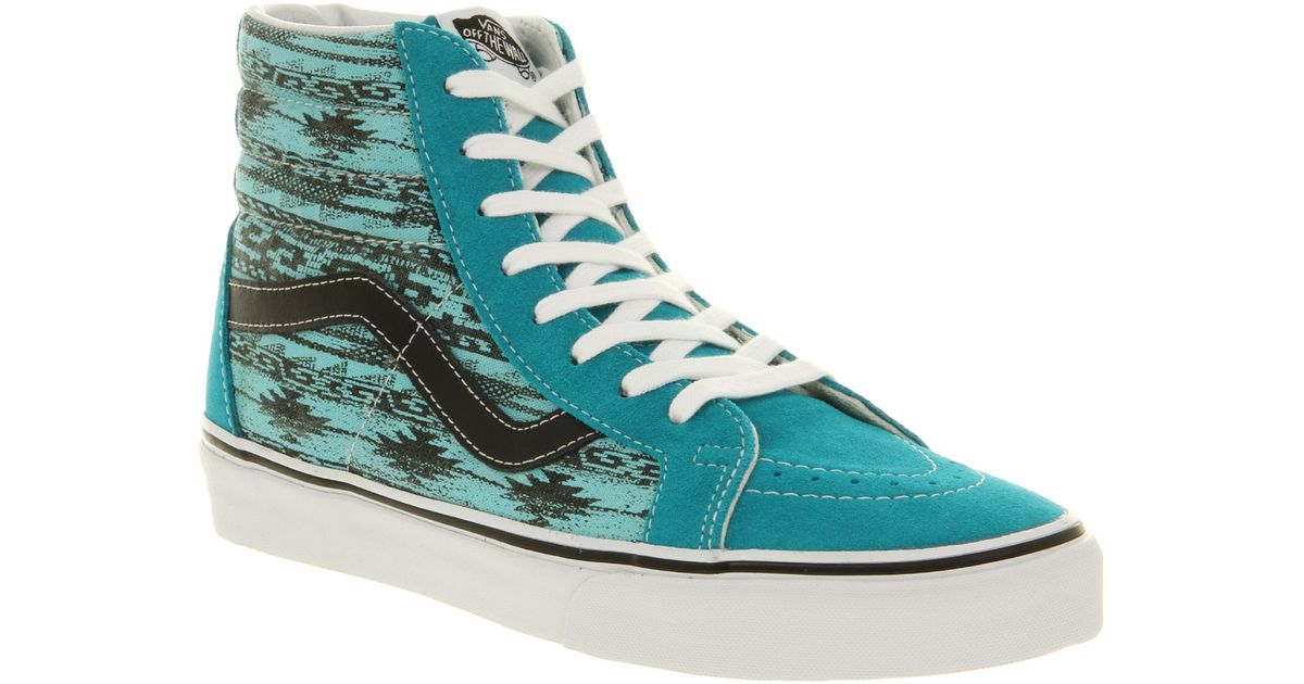 teal and blue vans
