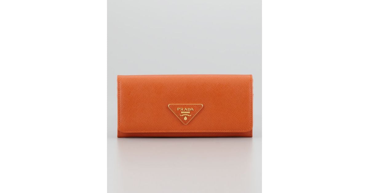 Prada Saffiano Triangle Continental Flap Wallet in Orange | Lyst  