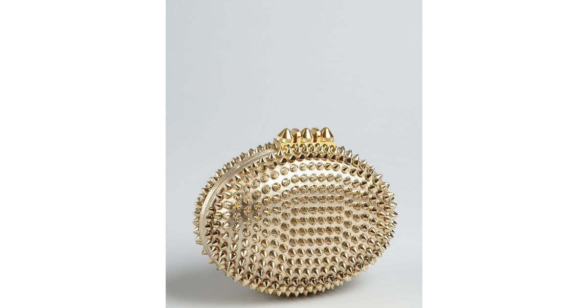 christian louboutin gold clutch