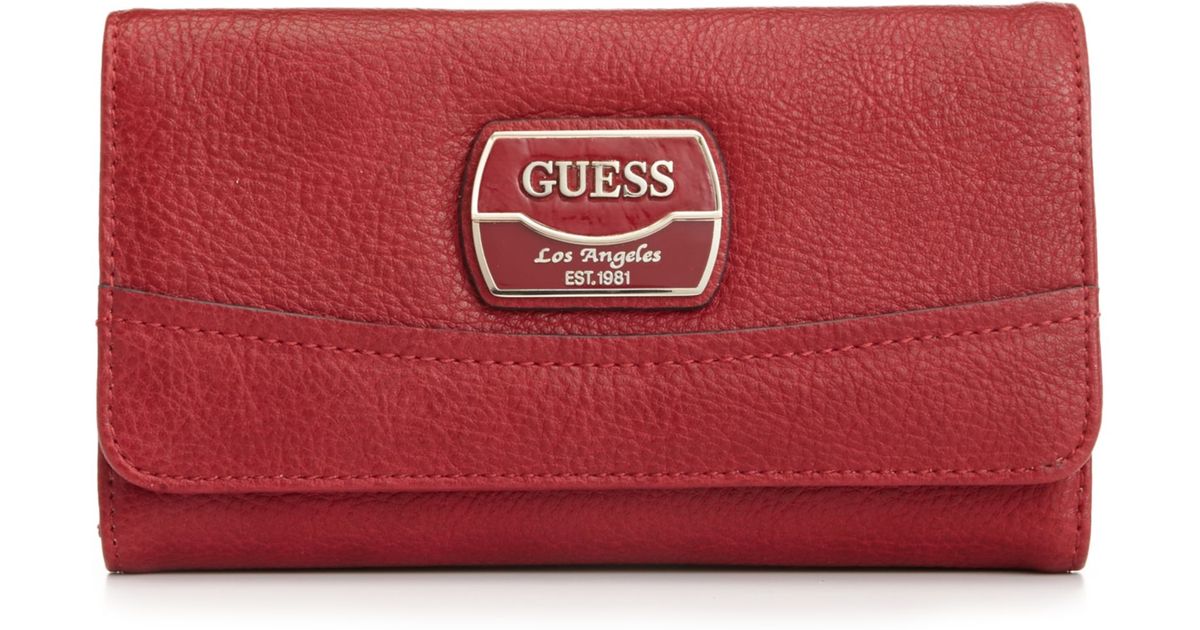 Lyst Guess Handbag Hazelton Slim Clutch Wallet In Red