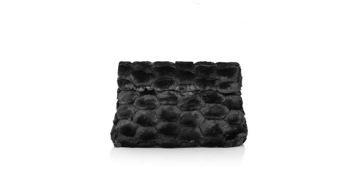 Lyst Top Dotty Faux Fur Clutch Bag In Black