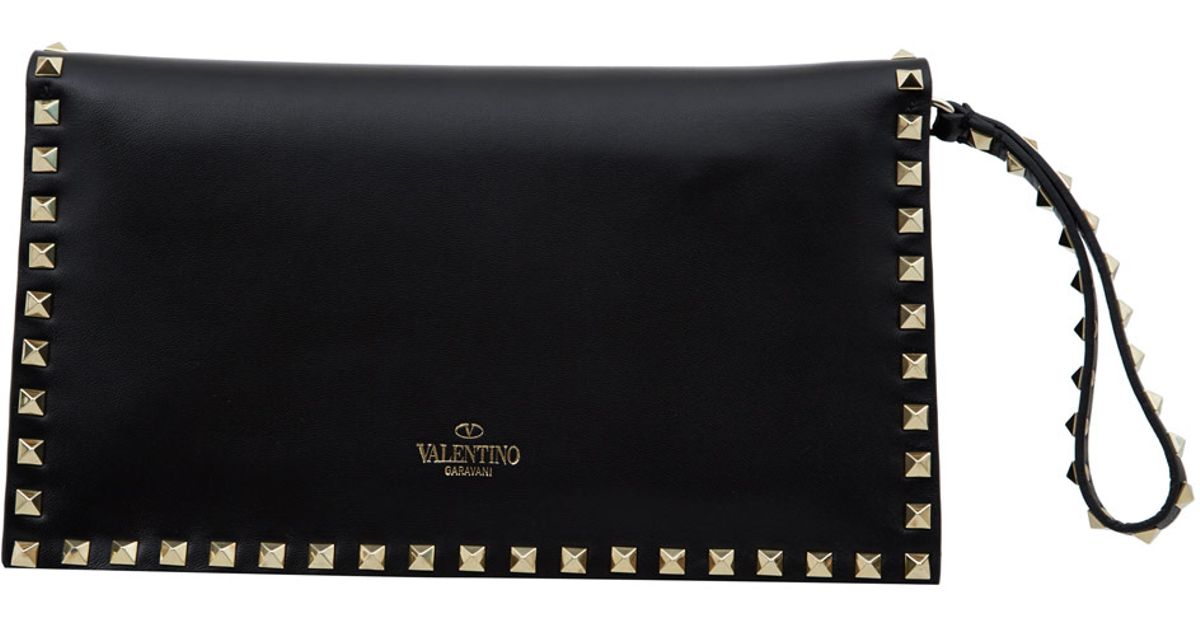 Lyst Valentino Black Rockstud Leather Clutch Bag In