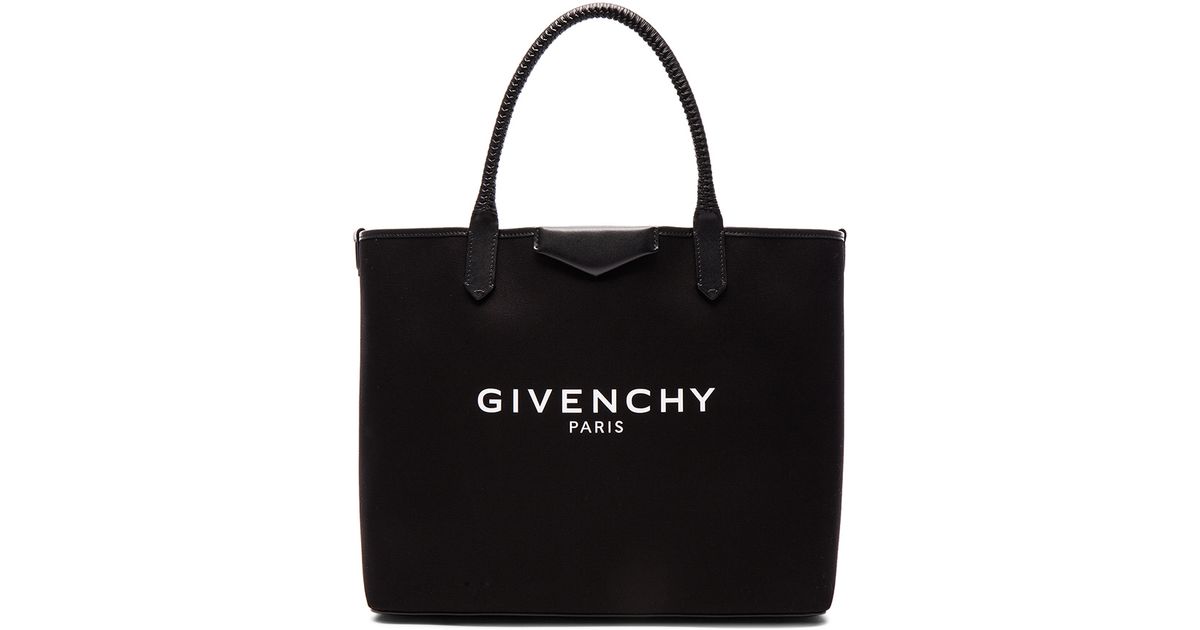 givenchy large logo print antigona canvas shopper bag in black lyst givenchy large logo print antigona canvas shopper bag in black lyst