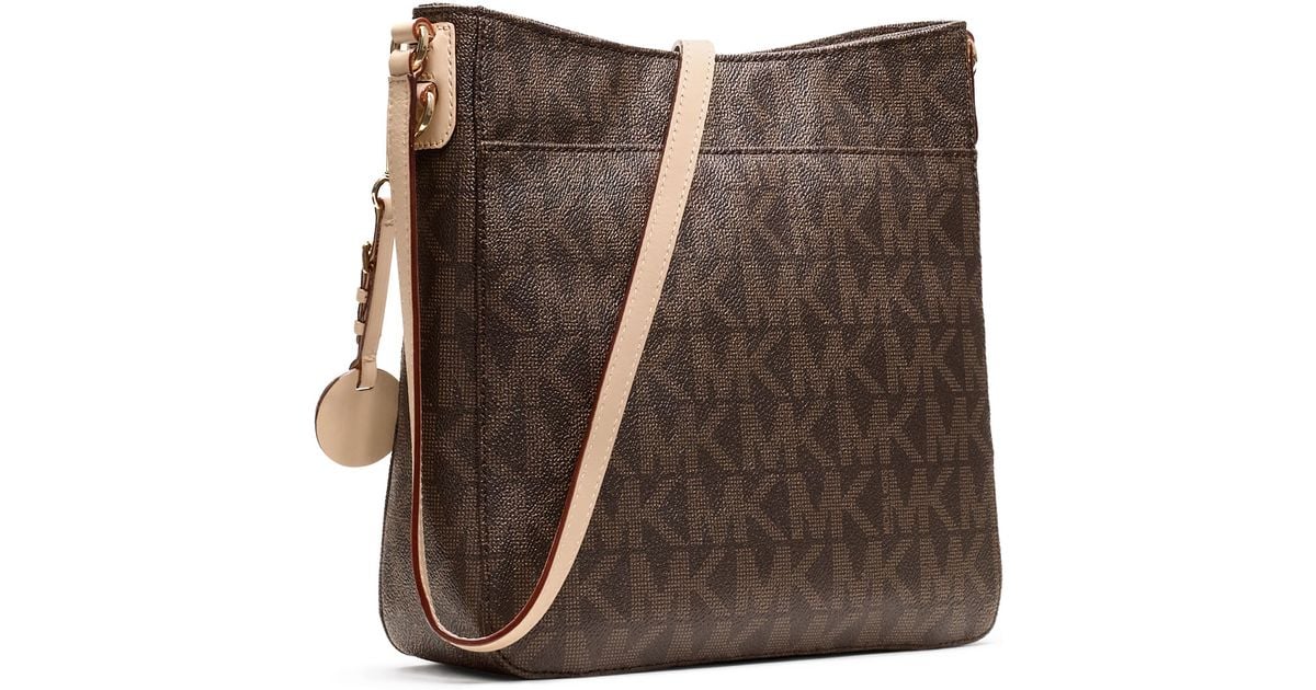 Lyst Michael Kors Jet Set Large Travel Logo Messenger Bag Lyst Michael Kors Jet Set Large Travel Logo Messenger Bag In Brown
