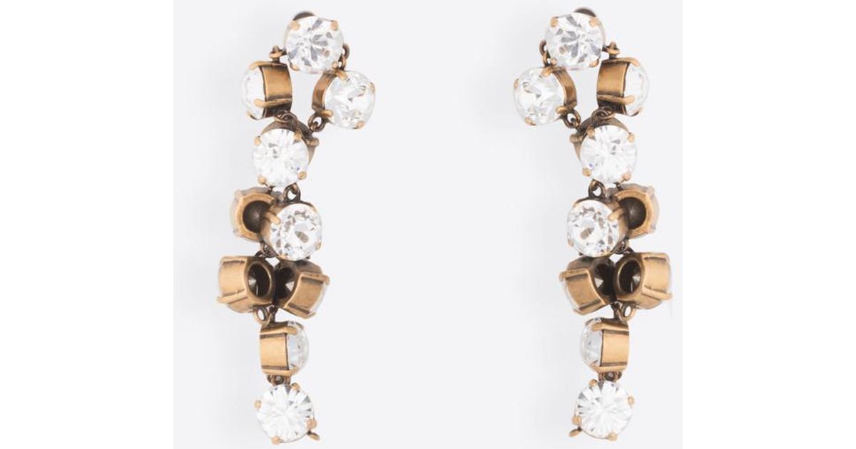 Lyst Balenciaga Twist Earrings In Metallic