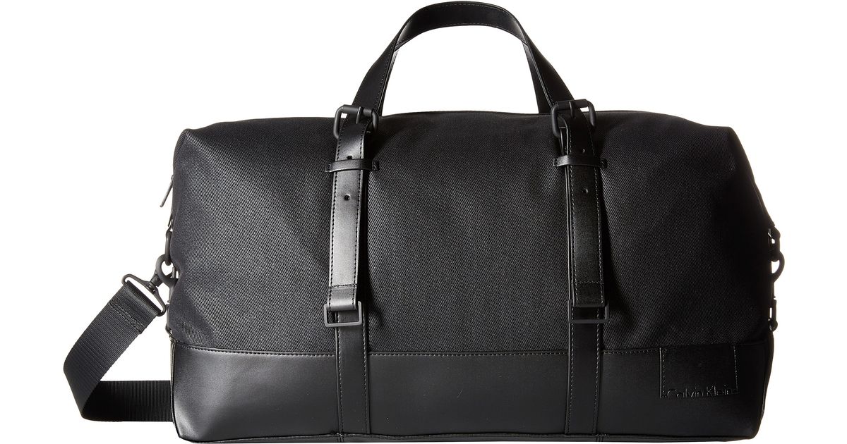 Lyst Calvin Klein Coated Canvas Duffel Bag In Black For Men