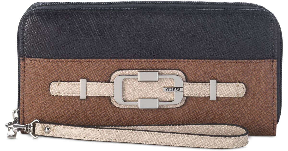 Lyst Guess Jonsi Large Zip Around Wristlet Wallet in Black