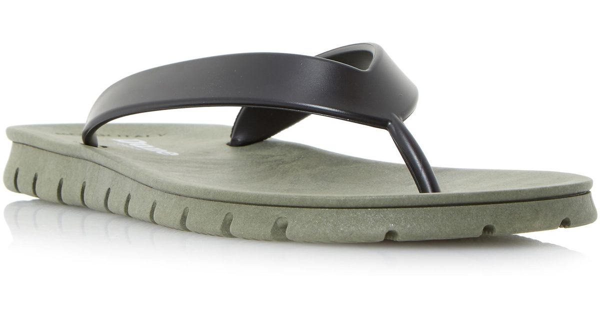 dune tan flip flops