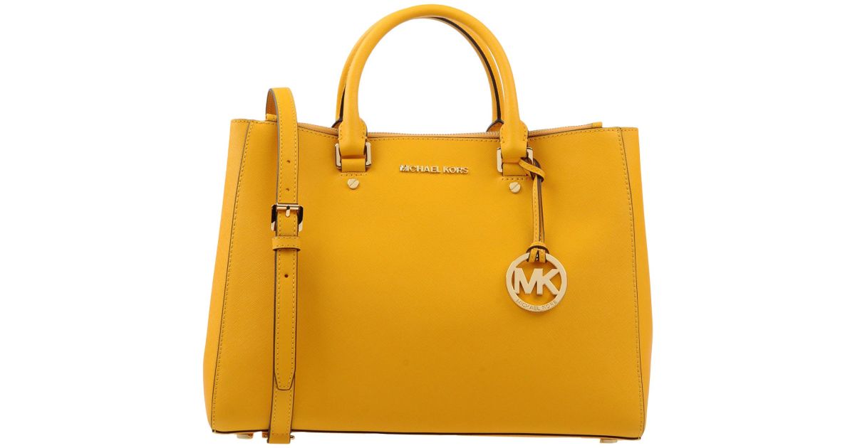 Lyst Michael Kors Handbag In Yellow
