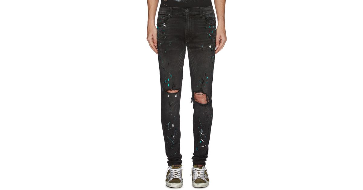 black ripped paint splatter jeans