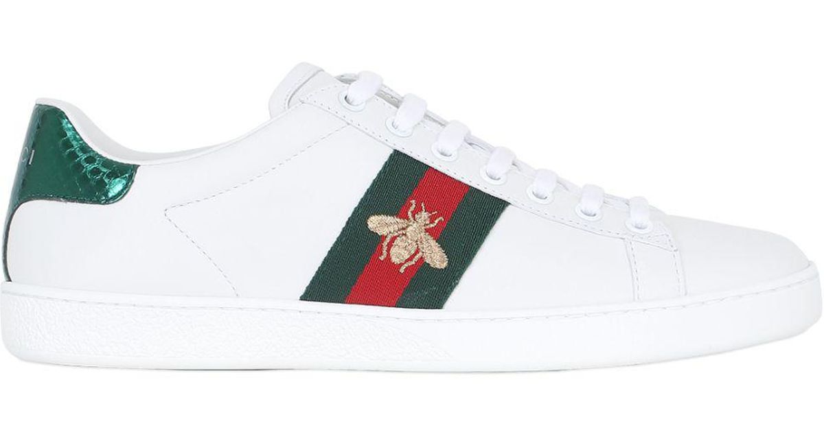 Gucci New Ace Embroidered Bee Leather Sneakers in White - Save 1.