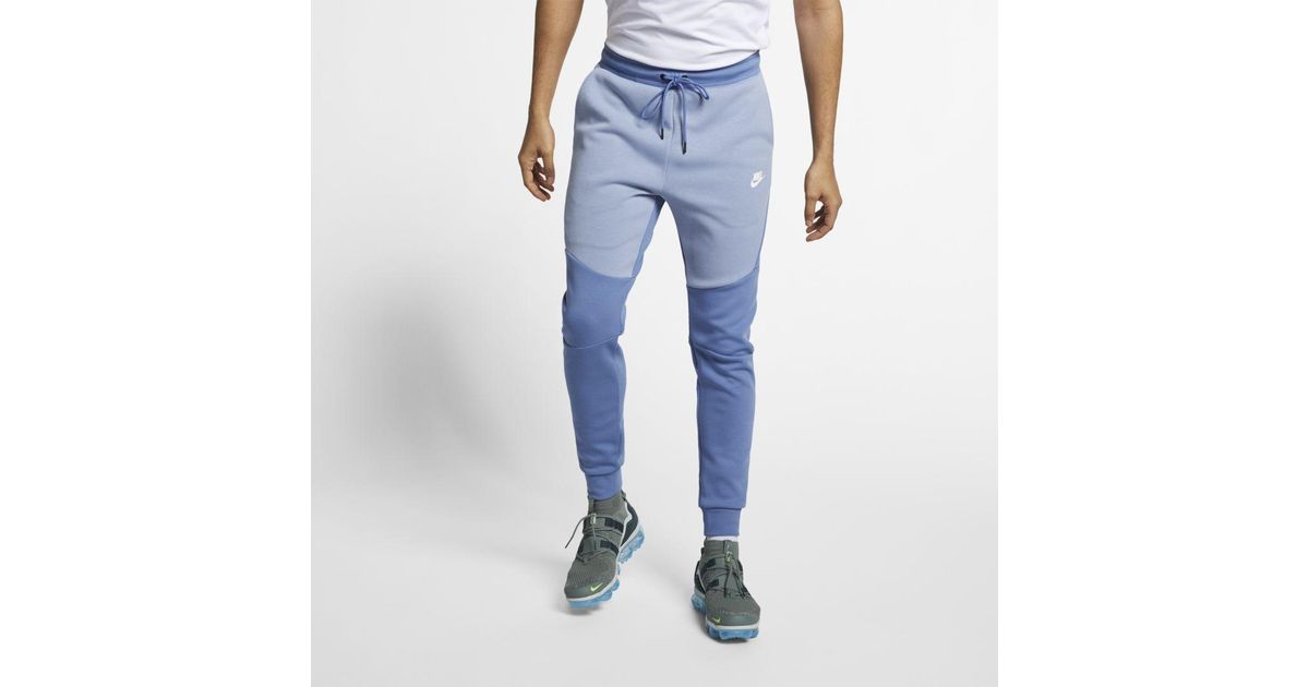 nike tech fleece joggers men's blue