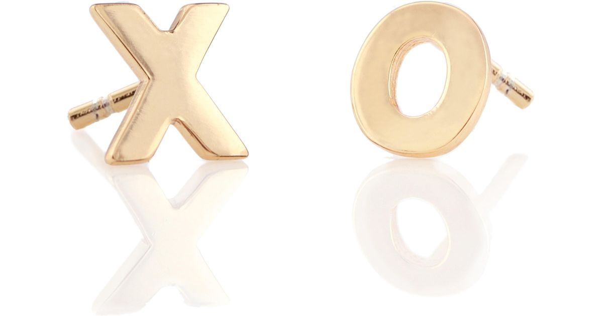 Lyst Kris Nations Xo Stud Earrings In Metallic