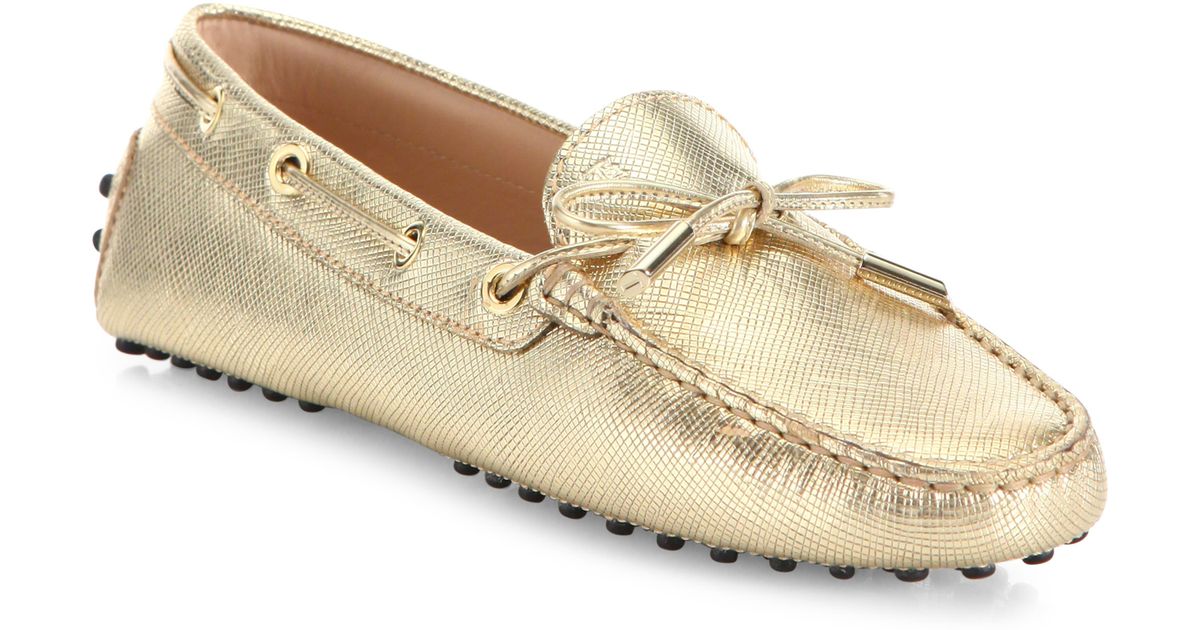 tods gold loafers