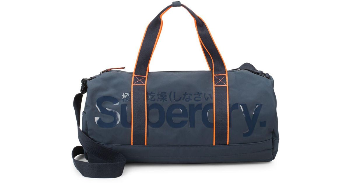 Lyst Superdry Retro Work Barrel Gym Bag In Blue