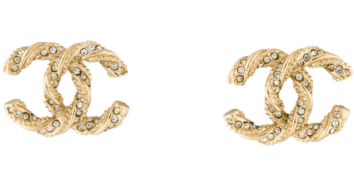 Lyst Chanel Crystal Twisted Cc Stud Earrings Gold In Metallic